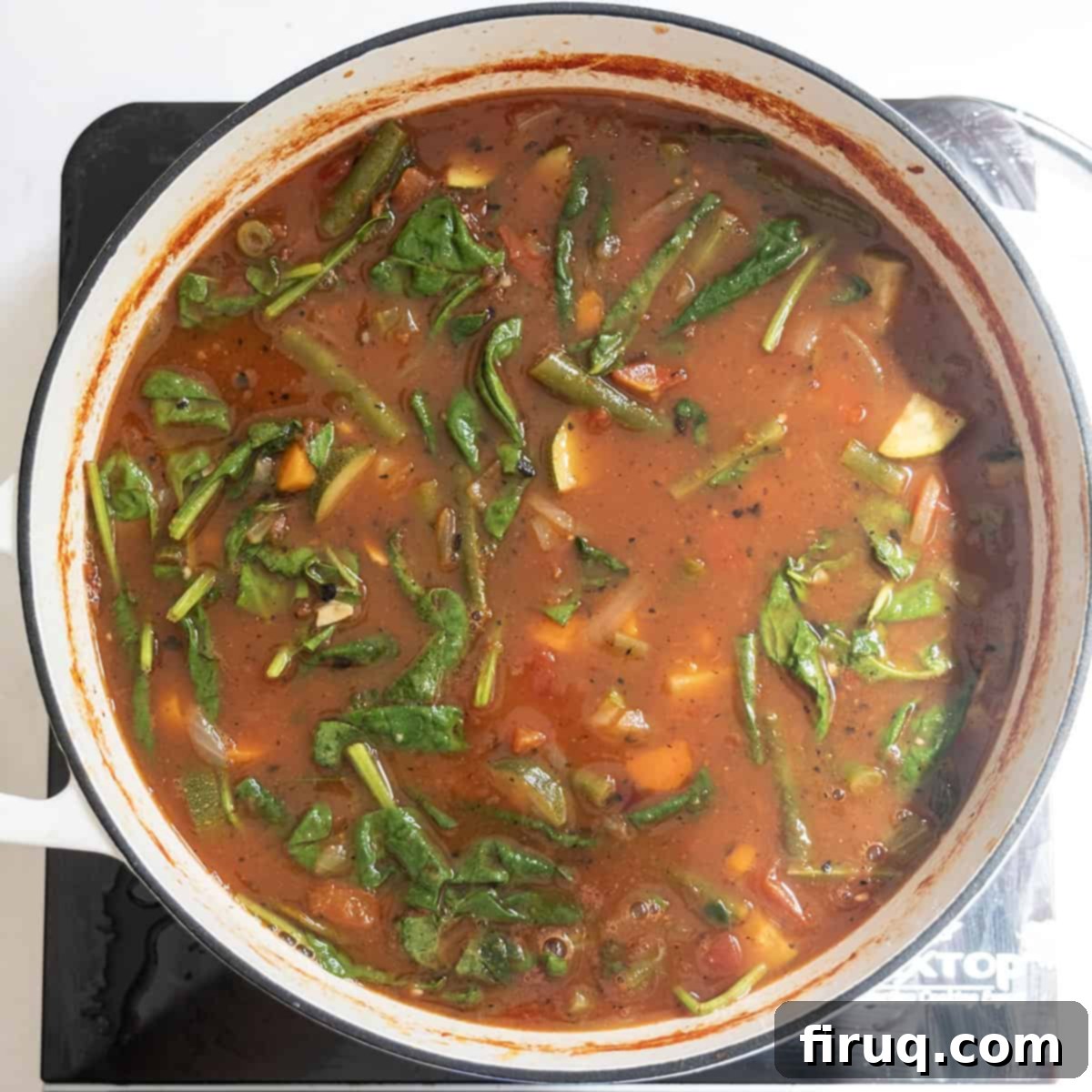 Authentic Italian Minestrone 8 Spinach wilted into the soup.