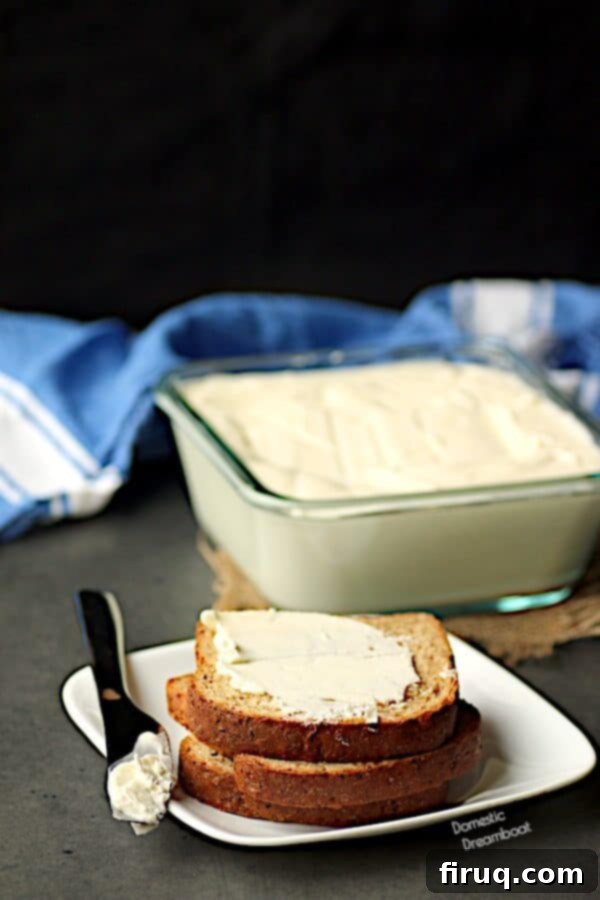 Whole grain bread with homemade spreadable butter, a healthy breakfast. Homemade spreadable butter on whole grain bread