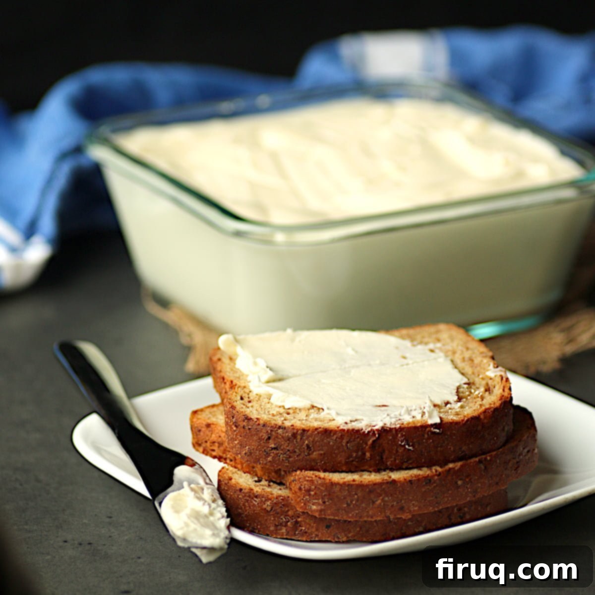The Secret to Perfectly Spreadable Homemade Butter 2 Homemade spreadable butter on wheat bread.