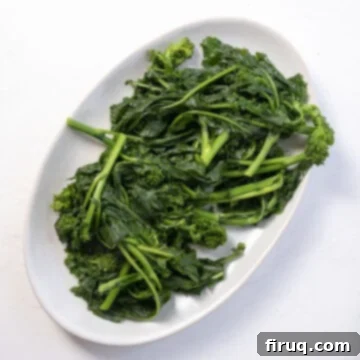 Sausage and Rapini Pasta 5 Boiled broccoli rabe on a plate.