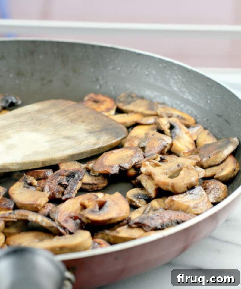 The Ultimate Holiday Stuffing 6 Sliced cremini mushrooms beautifully browned to perfection in a skillet