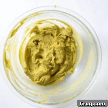 Emerald Dream Tiramisu 8 The fluffy egg mixture gently folded into the pistachio mascarpone mixture.