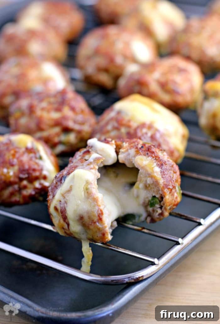 Fiery Smoked Pork Bombs with Melted Jalapeño Cheese 3 Smoked Jalapeno Cheese-Stuffed Pork Balls