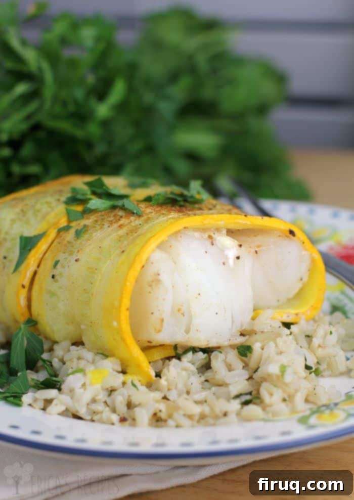 Zucchini-Ribboned Cod with Garlic Cilantro Rice 2 Golden Zucchini Wrapped Cod over Garlic Cilantro Rice from EricasRecipes.com
