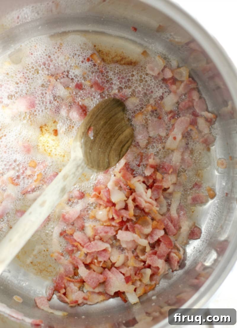 Cowboy Style Mexican Beans 4 chopped bacon cooking in a pot