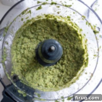 Fresh Pea Pesto 5 Lemon and olive oil added to food processor and processed to smooth.