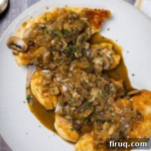 Rich Marsala Chicken with Sautéed Mushrooms 13 A serving of chicken marsala on a plate, showcasing the chicken and rich mushroom sauce.