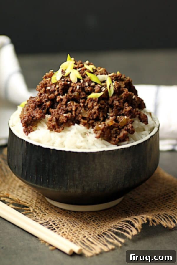 Korean Beef and Mushroom Mixture Close-up of the Korean beef and mushroom mixture in a skillet, showing the well-blended texture.