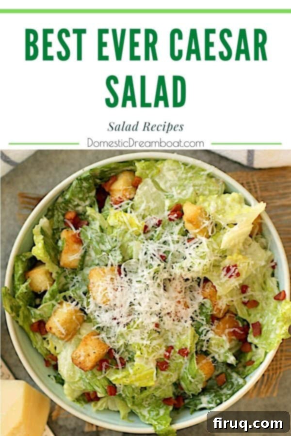 Final Plating of Homemade Caesar Salad Overhead photo of a serving of Caesar salad with shredded Parmesan, perfectly dressed and ready.
