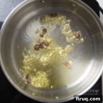 Robust Red Clam Linguine 4 Minced garlic and anchovy fillets gently sizzling in shimmering olive oil in a saucepan.