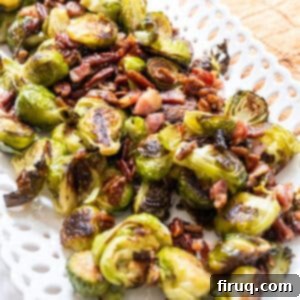 Roasted Maple Bacon Brussels Sprouts 11 Brussels sprouts plated with bacon and pecans drizzled with maple syrup.