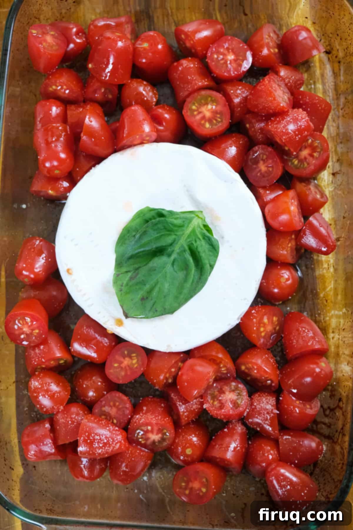 Velvety Brie Pasta 3 Brie round ready for baking with cherry tomatoes and seasonings