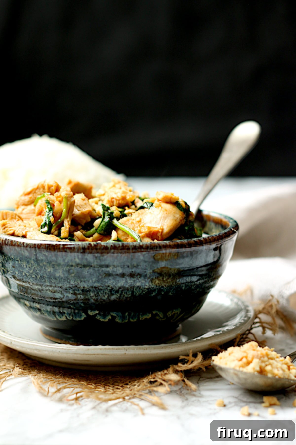 Serving of Thai Swimming Rama Chicken Thai Swimming Rama Chicken in a bowl.