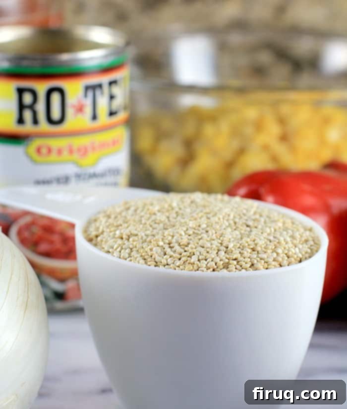 Set-It-And-Forget-It Quinoa Tamale Casserole 4 white measure cup with quinoa