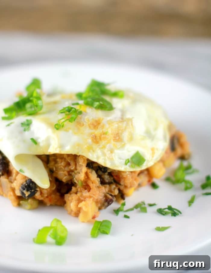 Set-It-And-Forget-It Quinoa Tamale Casserole 8 egg on top of tamale casserole on plate