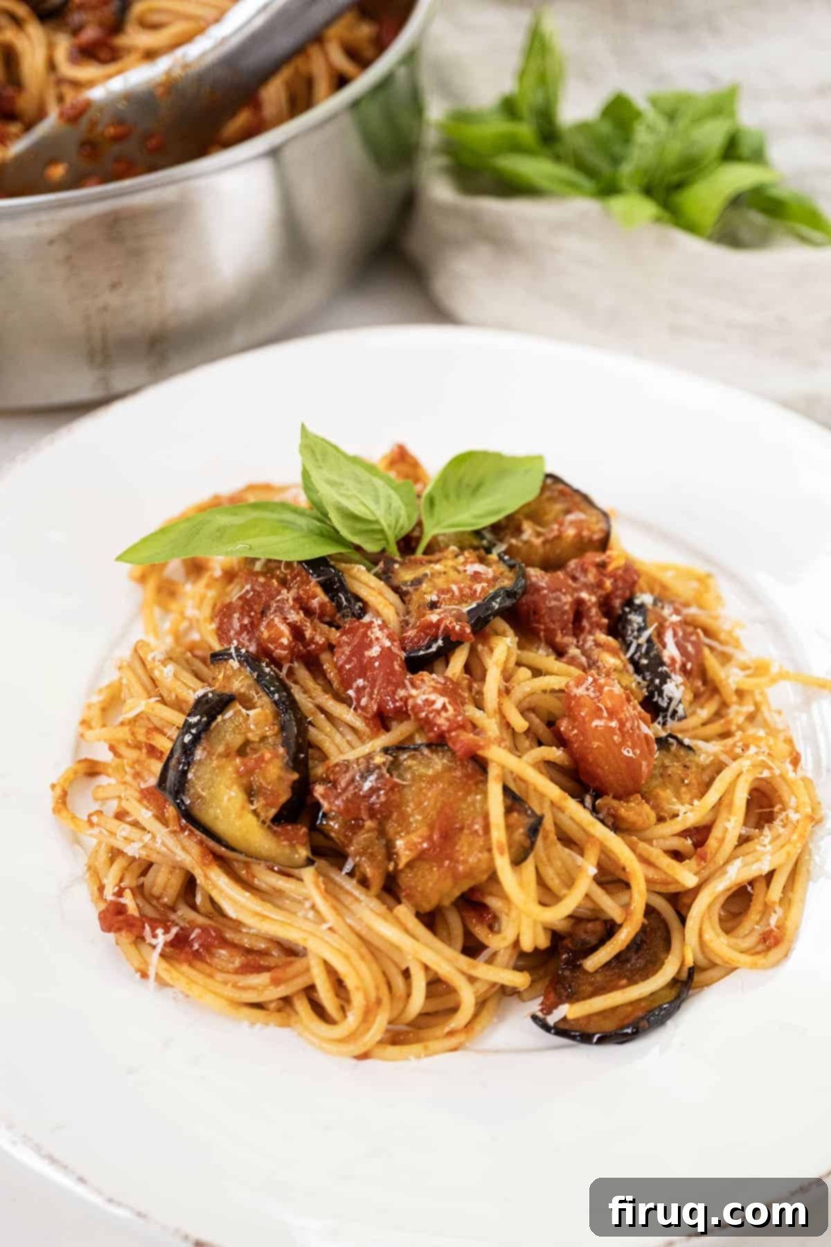 Pasta alla Norma: Sicilian Classic 2 Pasta alla norma plated on a dish and garnished with basil.