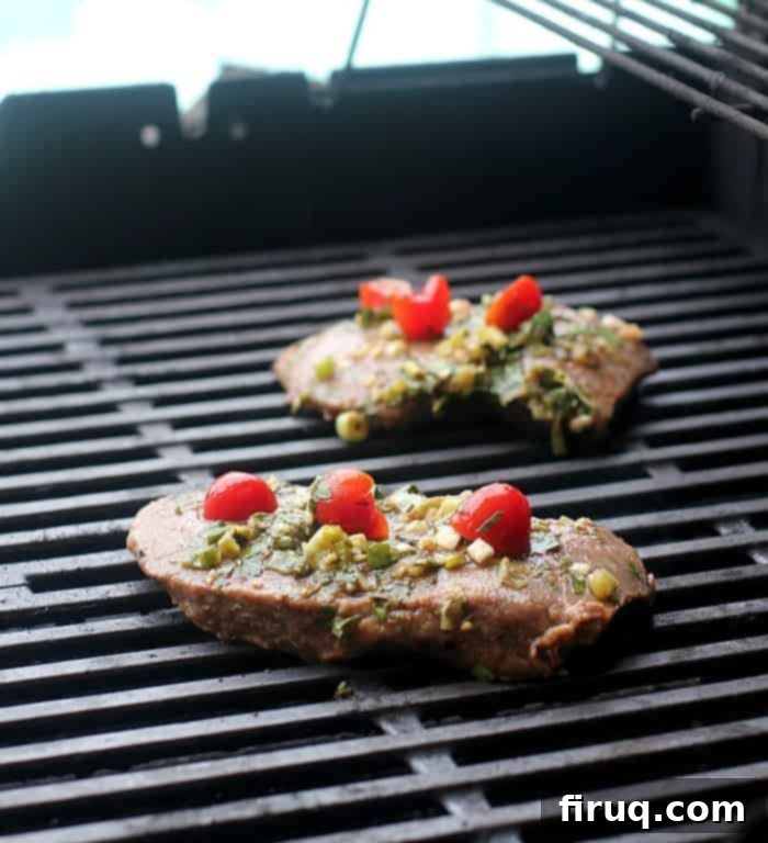 Sizzling Caribbean Steak Tacos 6 2 steaks cooking on a grill