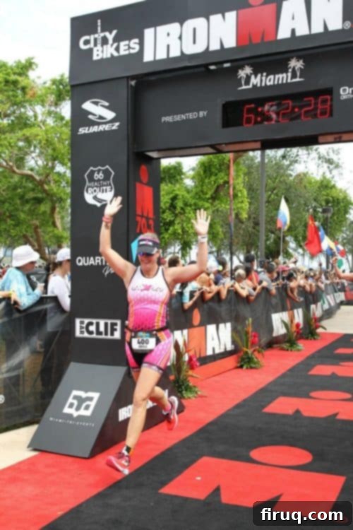 Ironman Miami 70.3 Race Recap: Pelotons and Pizza 11 Triumphant finish line moment at Ironman Miami 70.3.