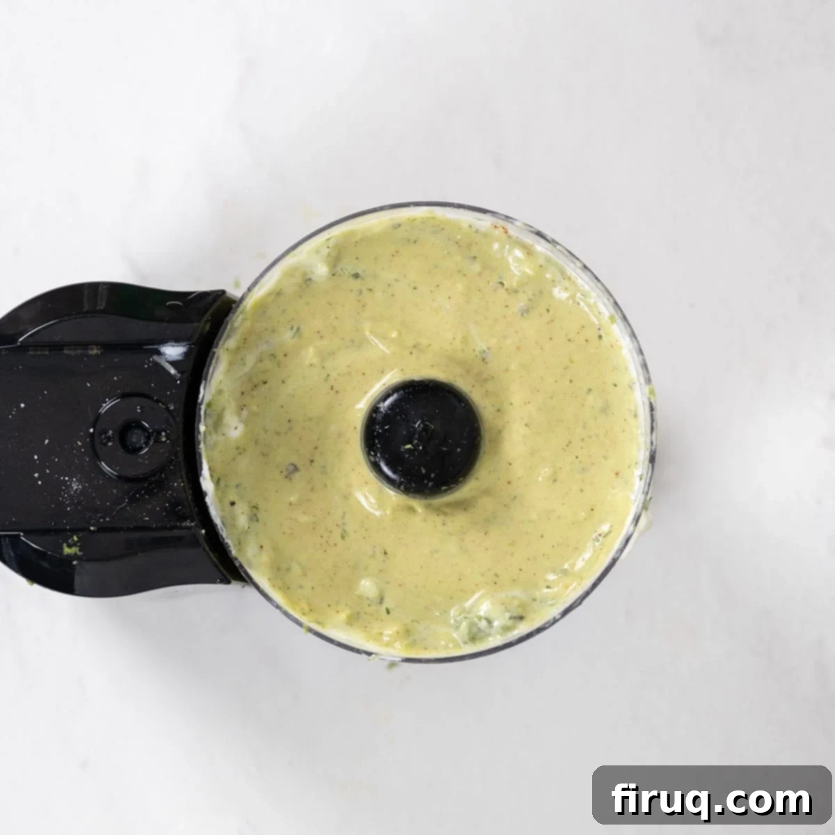 Vibrant Avocado Lime Sauce 9 crema processed in the food processor.