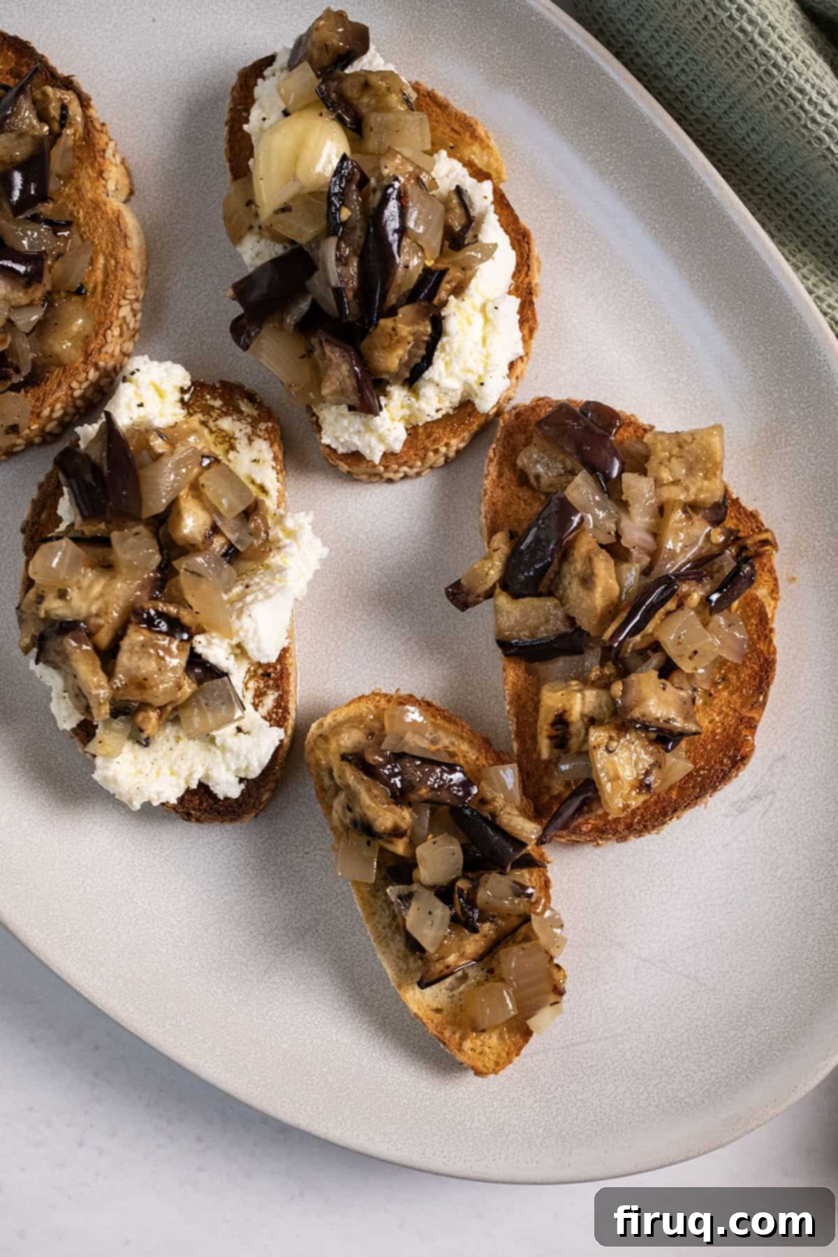 Zesty Eggplant and Onion Medley 2 Marinated eggplant on toast with ricotta.