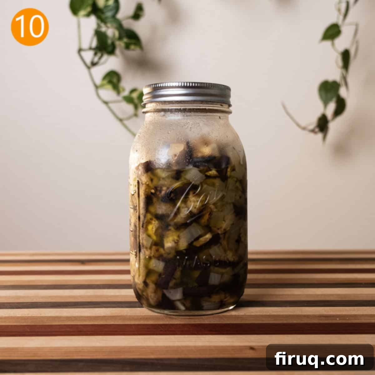 Zesty Eggplant and Onion Medley 8 Eggplant and onions marinating in a mason jar.