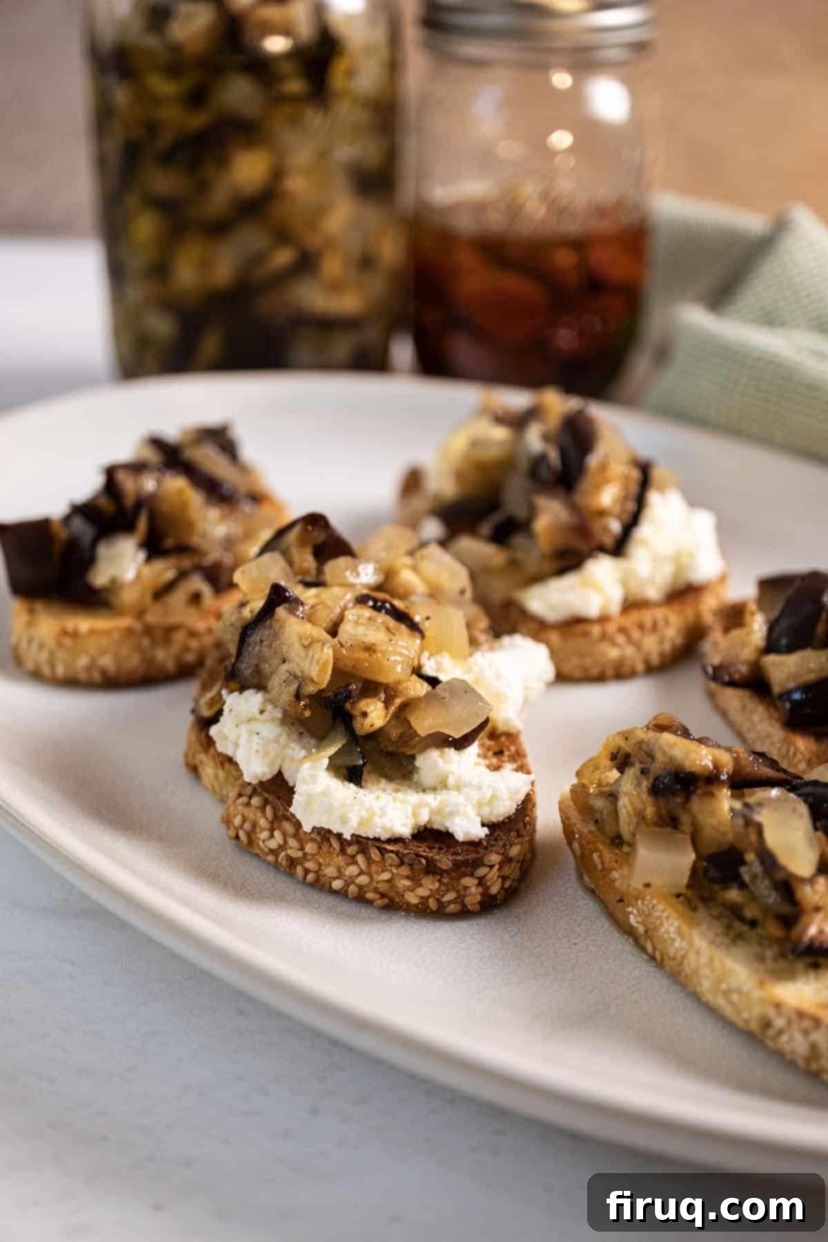 Zesty Eggplant and Onion Medley 9 Marinated eggplant on toast with ricotta.