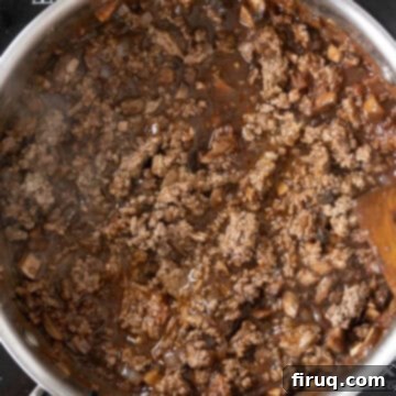 Effortless Lamb Ragu with Pappardelle 10 Lamb returned to the saucepan with sauce.