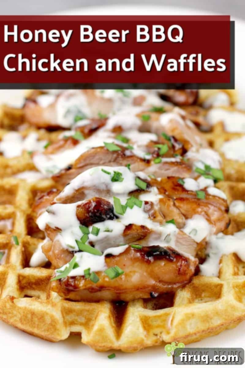 Honeyed Ale BBQ Chicken Waffle Stack 7 A beautifully arranged serving of Honey Beer BBQ Chicken and Waffles, showcasing the golden waffle, sliced chicken, and luscious dressings.