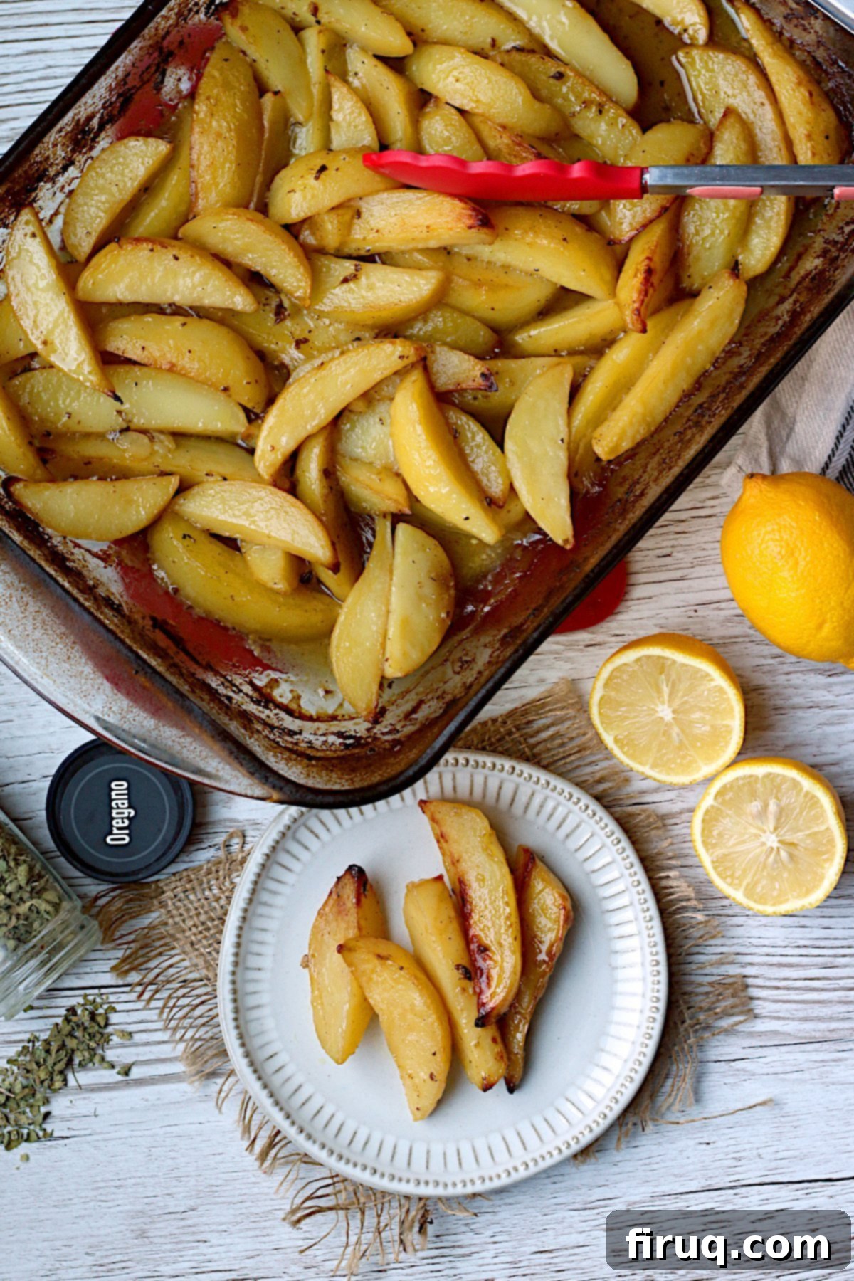 Greek Lemon Potato Platter Overhead photo of Greek Lemon Potatoes on a small white plate and in a large glass baking dish.