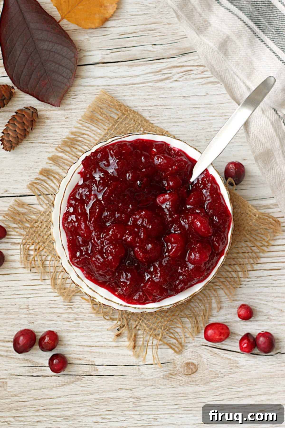 Delicious Homemade Cranberry Sauce Overhead photo of Easy Homemade Cranberry Sauce in a white bowl, perfect for holiday meals.