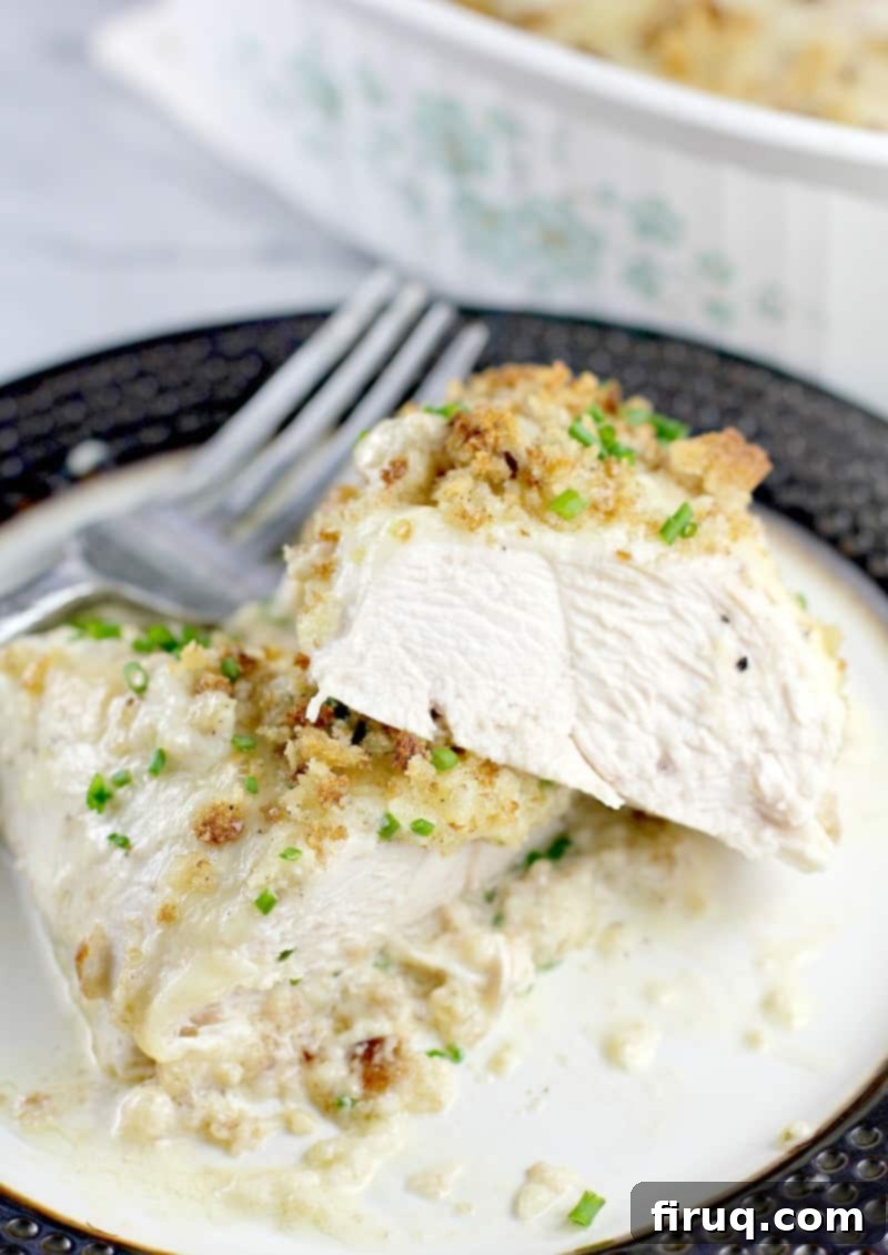 Baked Swiss Chicken Perfection 6 chicken on a dish cut to show juiciness throughout