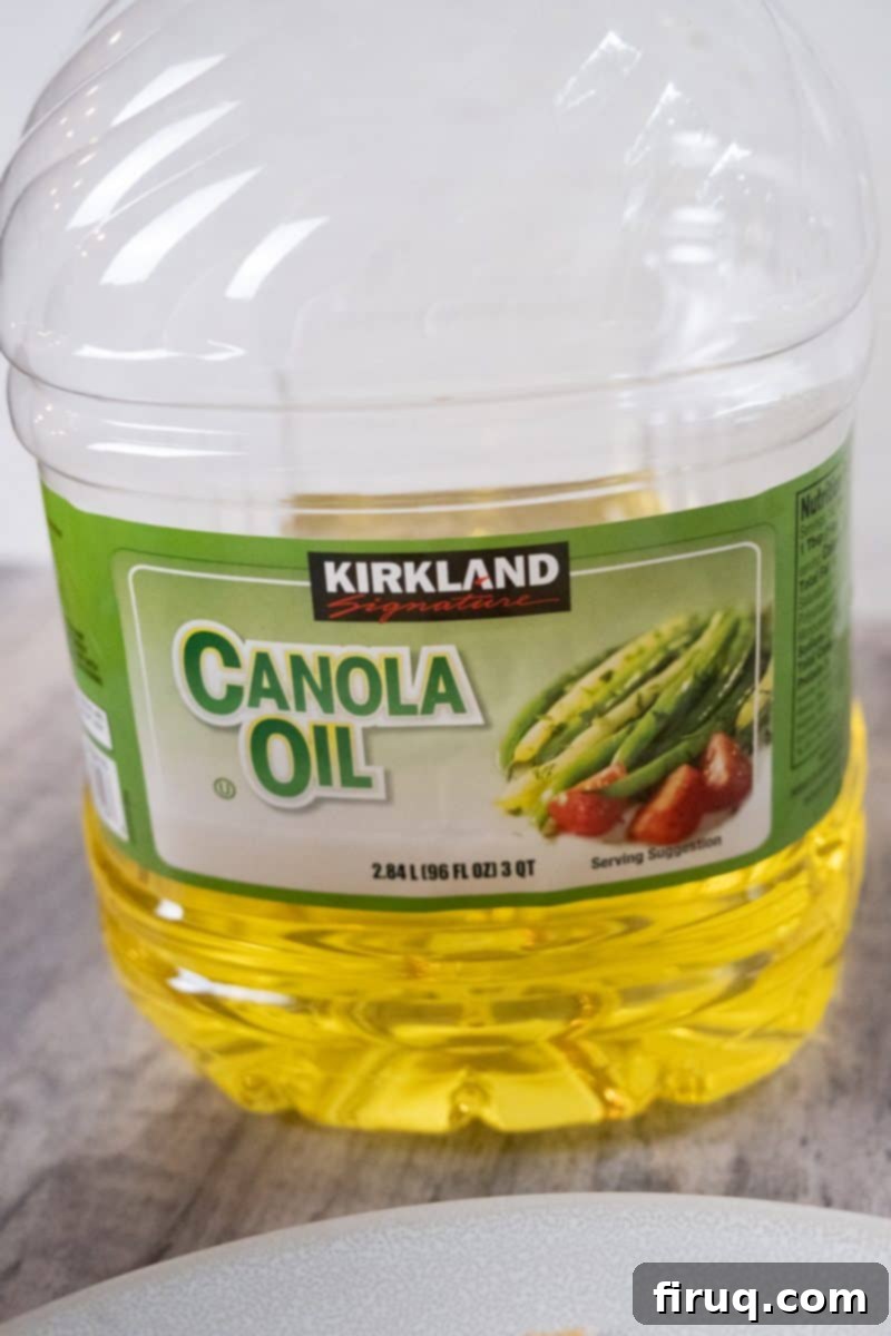 Best Oil for Crispy Chicken Cutlets 4 bottle of canola oil