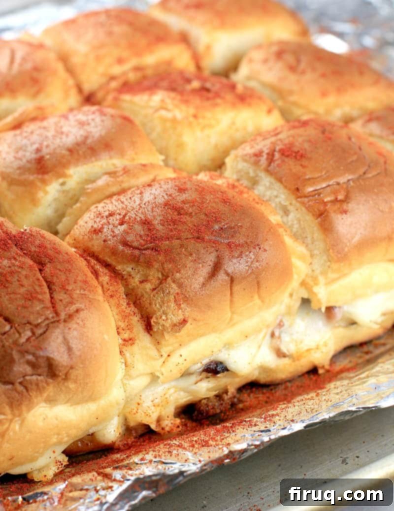 Aloha Maple Bacon Turkey Sliders 14 Side image showcasing the beautifully cooked Hawaiian roll turkey sliders, side by side, before being separated into individual servings.