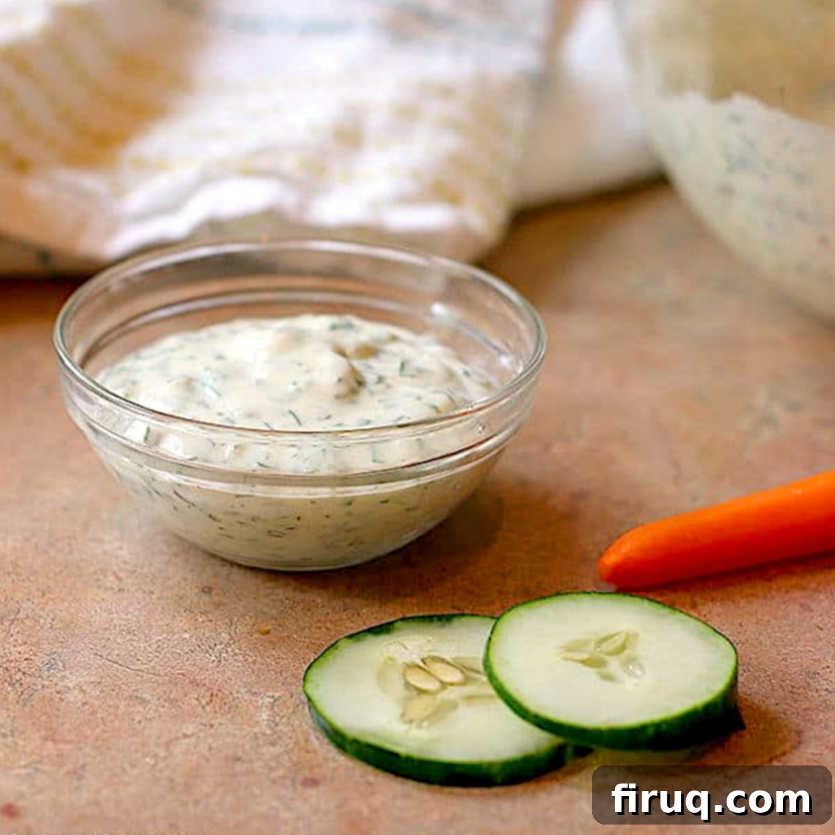 Light Ranch Dressing and Dip A bowl of creamy homemade ranch dressing with fresh herbs.