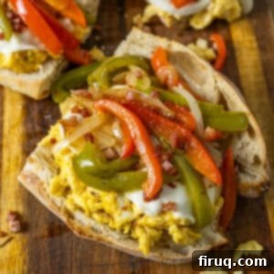 Garden Scramble Sandwich 11 Peppers and eggs sandwich with mozzarella and pancetta on Italian Bread.