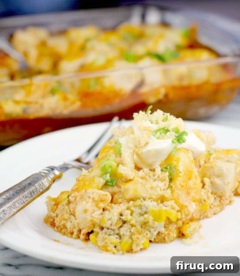 Unwrapped Keto Chicken Tamale Casserole 2 Finished low carb chicken recipe plated on a white plate; bake dish is in the background