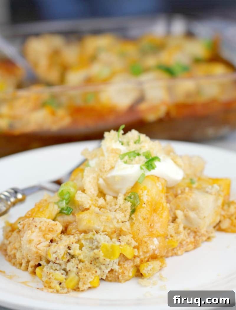 Unwrapped Keto Chicken Tamale Casserole 10 Finished casserole plated on a white plate; bake dish is in the background