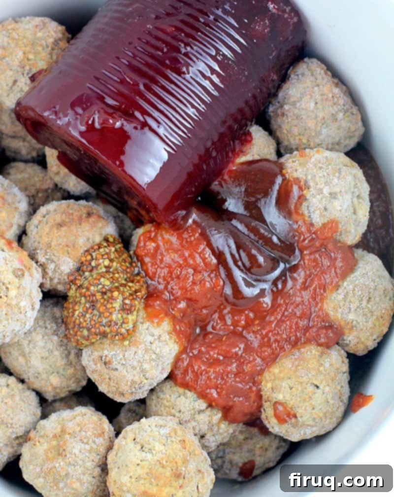 Slow Cooker Sweet Tangy Cranberry BBQ Meatballs 5 top down view into the crockpot showing all the ingredients not yet mixed