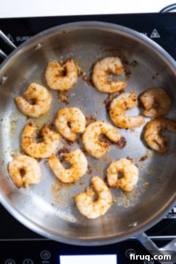Fiery Shrimp Linguine Fra Diavolo 5 Frying shrimp in the pan.