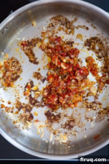 Fiery Shrimp Linguine Fra Diavolo 7 Caramelizing tomato paste and calabrian chili peppers.