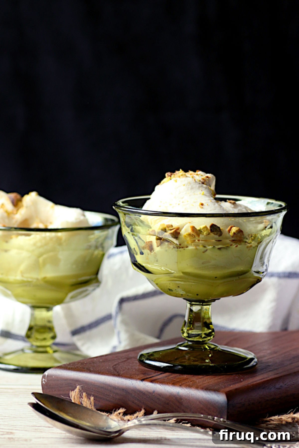 Ready-to-Serve Booza-Inspired Ice Cream Booza-Inspired Ice Cream in small green dessert dishes, showcasing the light pink color and smooth texture.