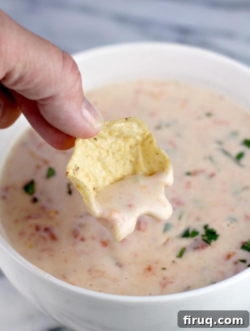 Dip into Blanco Bliss 6 tostitos scoop filled with queso