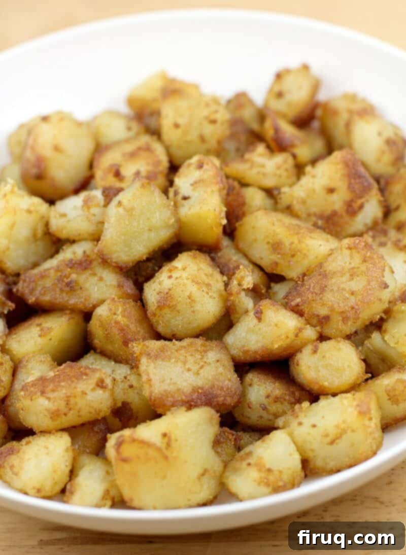 Zesty Cheesy Potato Bites 6 cooked potatoes in white bowl