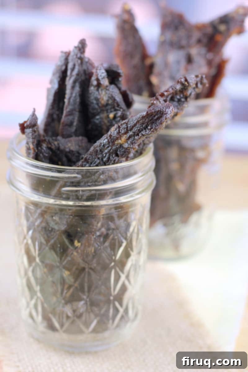 Homemade Beef Jerky Made Easy 3 side view of terijaki beef jerky in glass jar