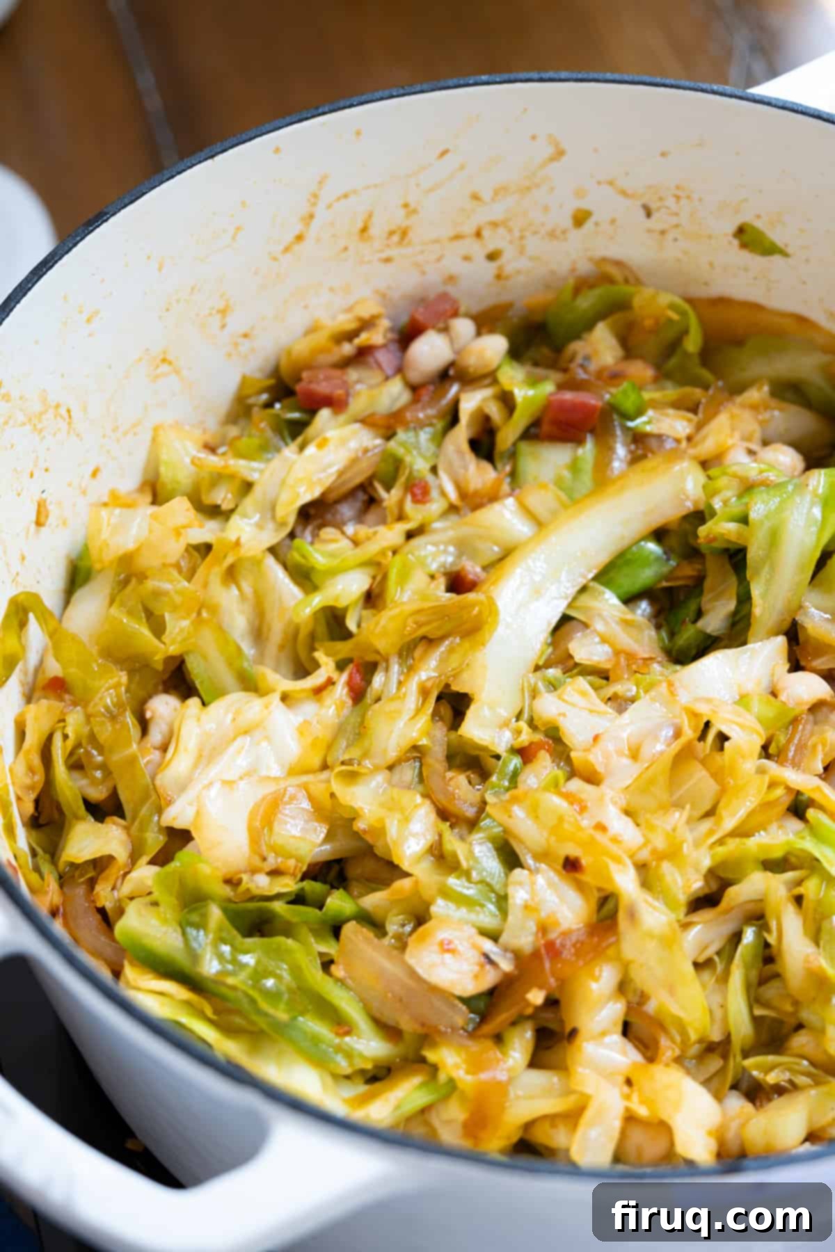 Hearty Italian Cabbage 10 Italian cabbage with pancetta gently wilting and simmering in the Dutch oven