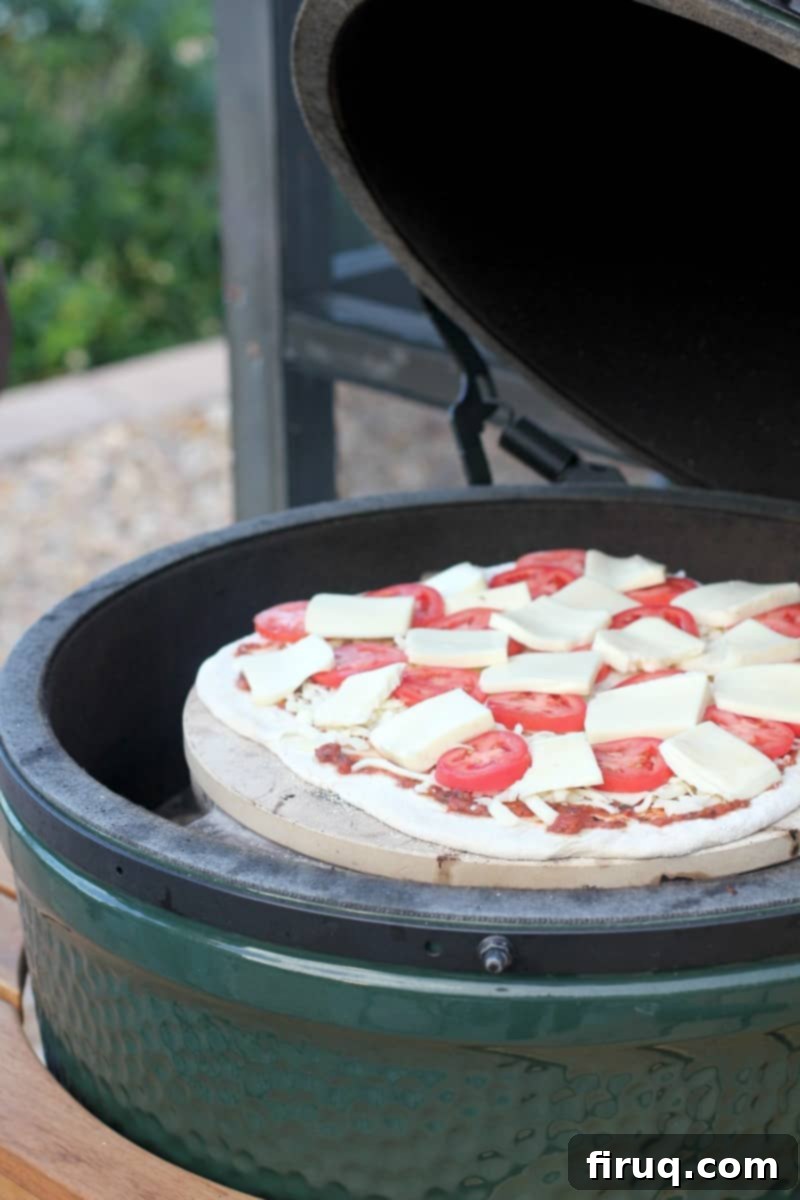 Perfect Pizza Margherita on the Big Green Egg 6 pizza cooking on the grill
