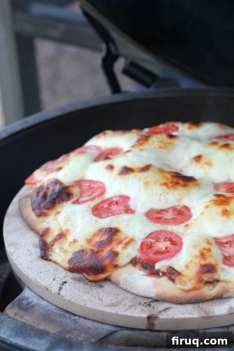 Perfect Pizza Margherita on the Big Green Egg 7 cooked pizza on the grill