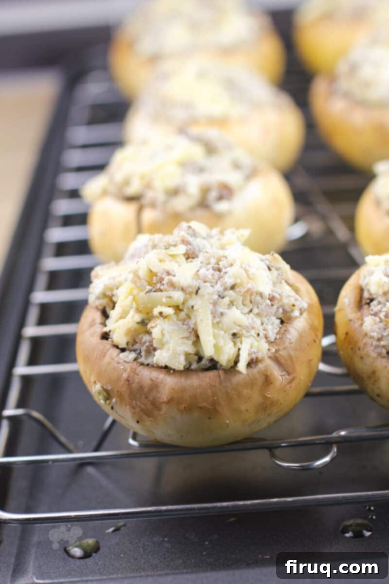 Savory Grilled Mushroom Delights 5 uncooked stuffed mushroom on grate
