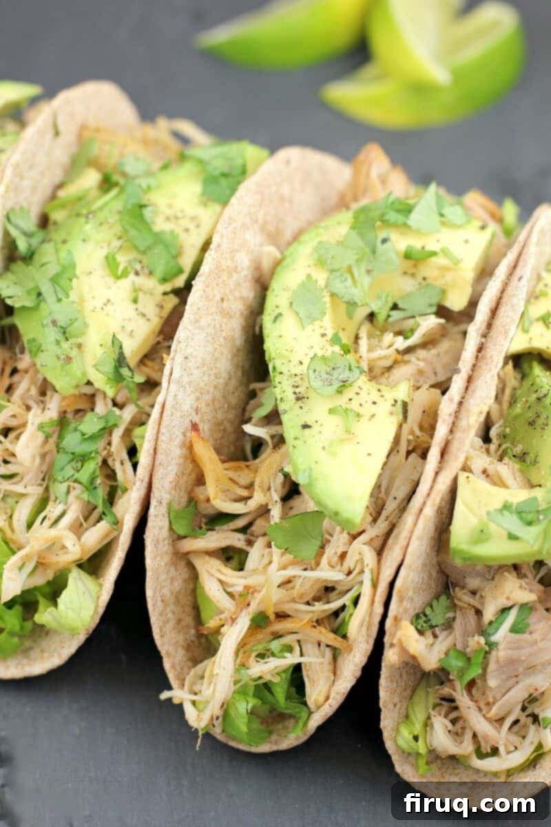 Instant Pot Chicken Carnitas 3 three tacos with chicken and avocado