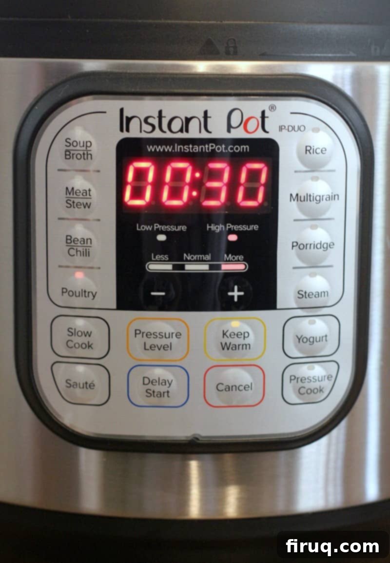 Instant Pot Chicken Carnitas 5 front panel of Instant Pot showing Poultry, More, and 30 minutes